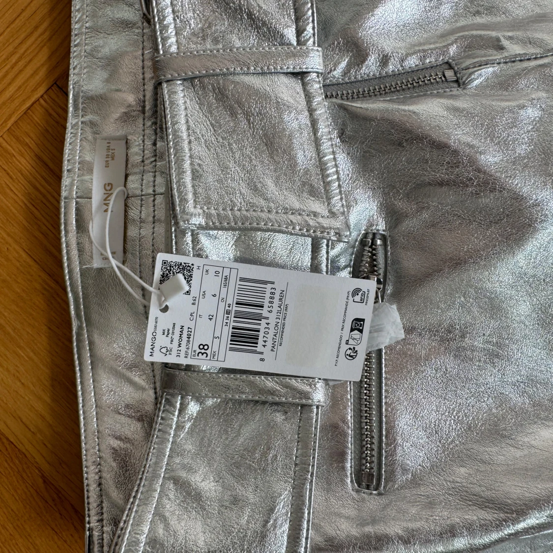 Silvriga lågmidjade bootcut byxor från Mango - 3