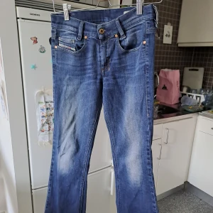 Diesel Jeans Low Waist Boot-cut Slim - Diesel Sandy-B 0814W stretch women's jeans slim-bootcut, 0814w, 25W x 30L Vintage, worn a couple times in the 90s, not work since. No damage, even all brand tags in great condition.  Last picture is how they fit taken from the internet 