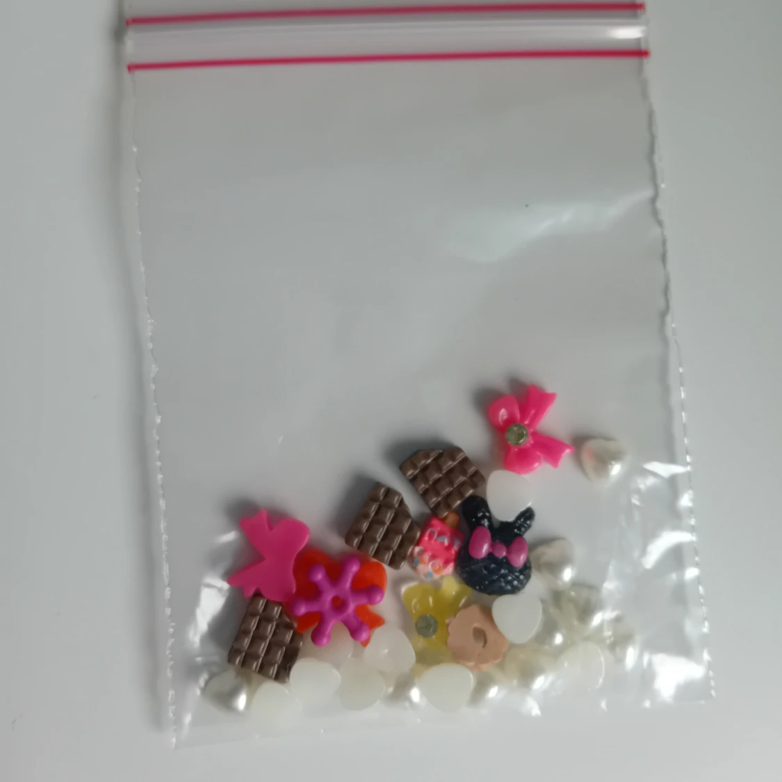 Nageldekorationer i olika färger och former - 4