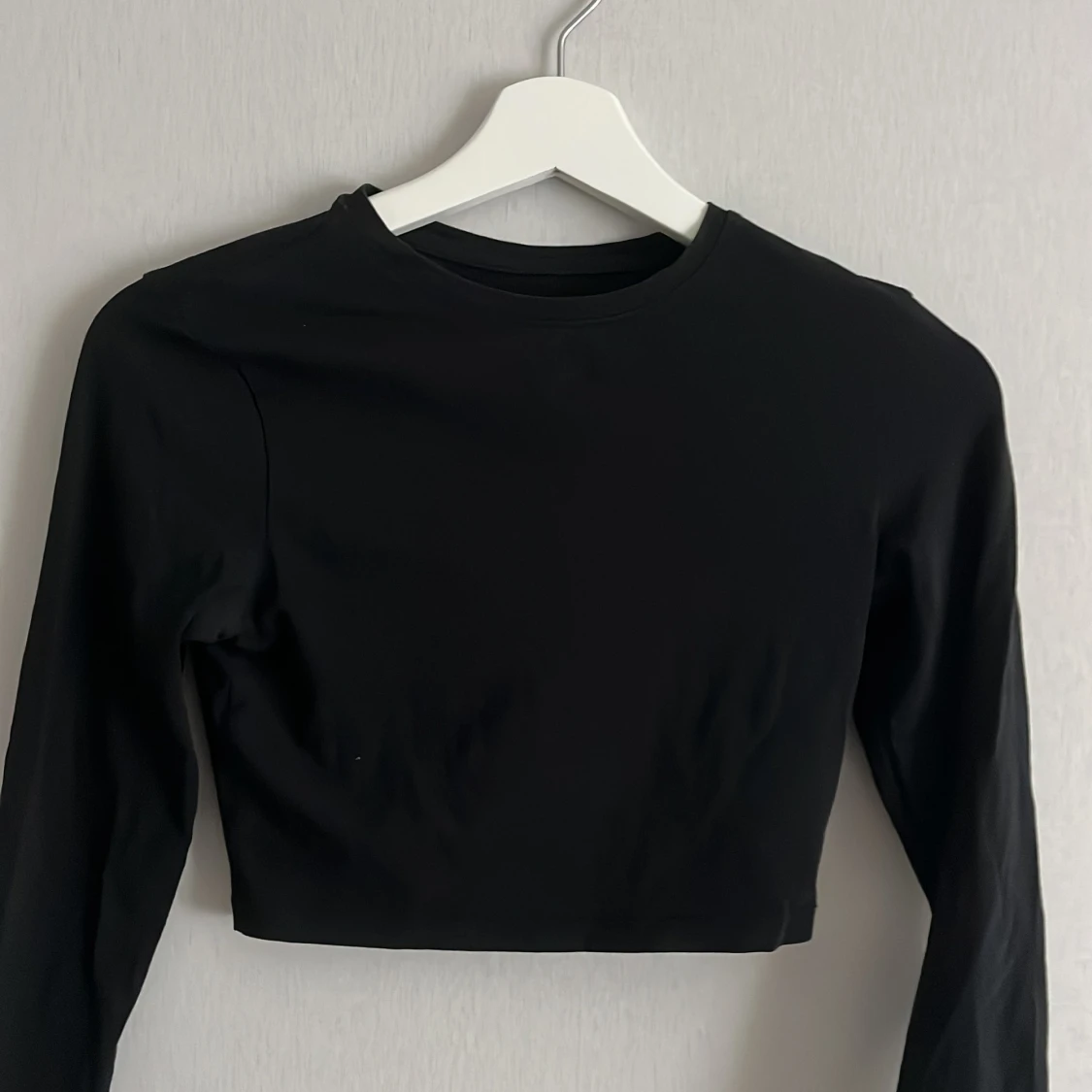 Svart, långärmad topp