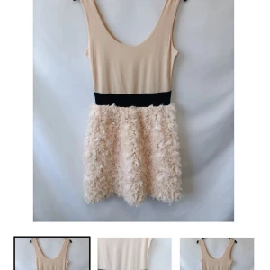 Beige klänning från Zara Basic - Snygg beige klänning från Zara Basic med en unik texturerad kjol och svart midjeband. Den är ärmlös och har en rundad halsringning. Perfekt för en stilfull look.