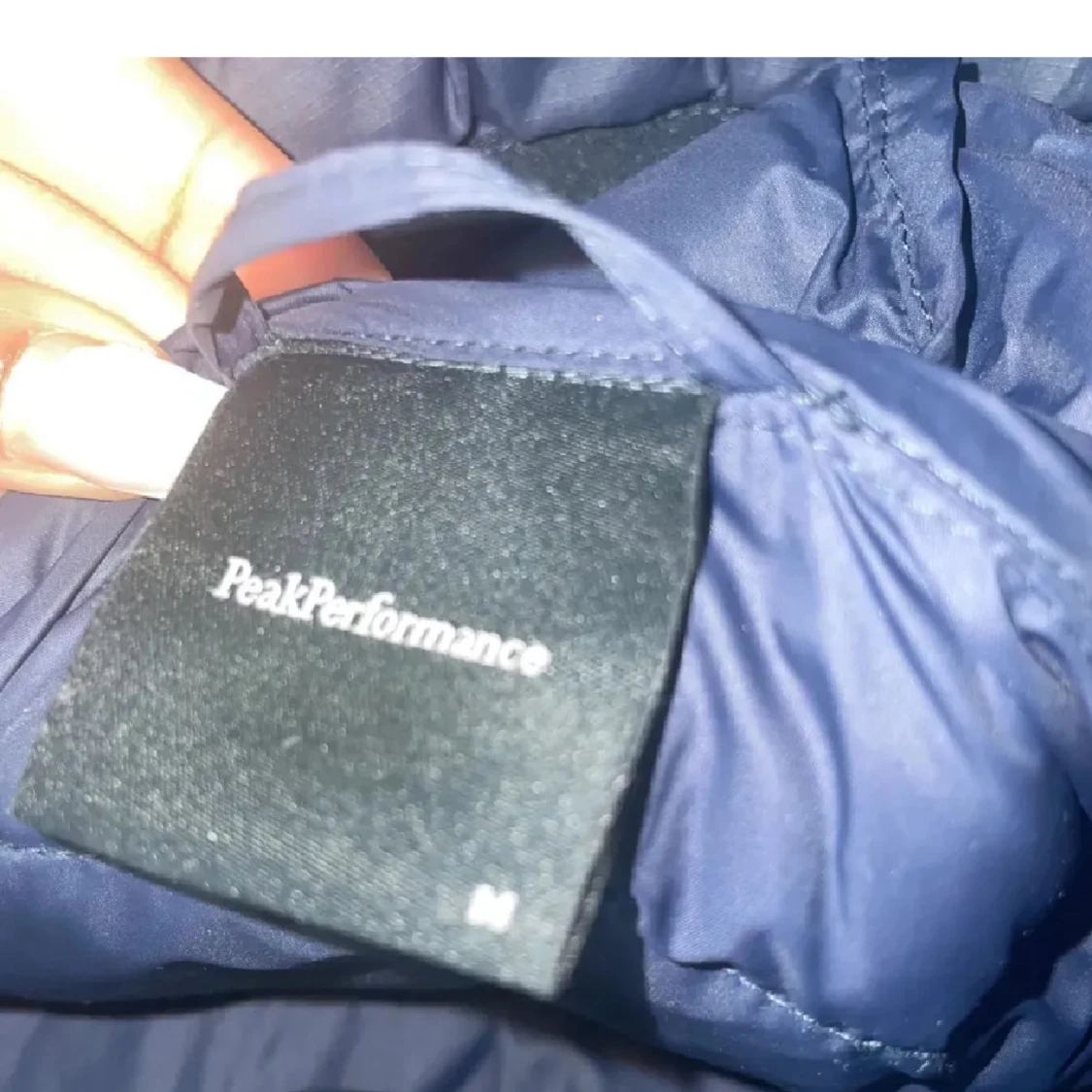 Blå dunjacka från Peak Performance - 1