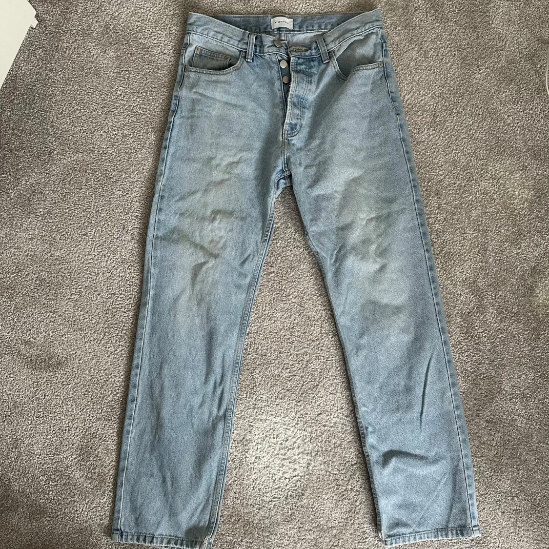 Ljusblå loose fit jeans från Studio Total, herr stl 30