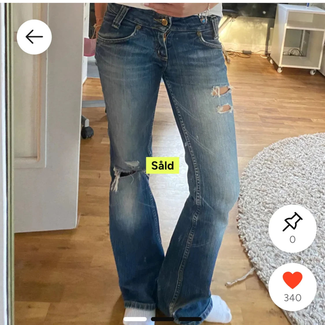 Lågmidjade blå bootcut jeans från Lee med slitningar - 2