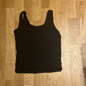 Svart linne strl M  - Vanligt svart linne, strl M