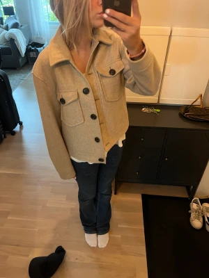 Kappa - Kort beige kappa ifrån vila. Bra skick 