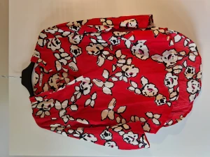 Blus  - Kort ärm, aldrig använd. 