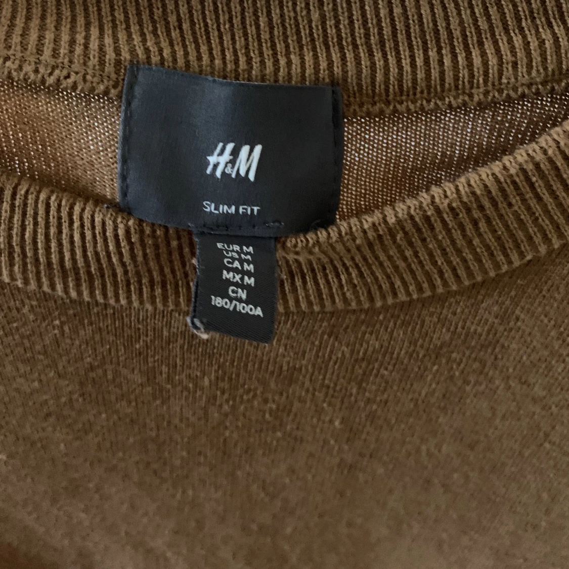 Brun stickad tröja - 90