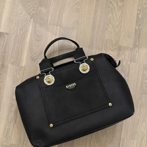 Versace  - Aldrig använd Versace västa. 