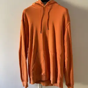 Orange  hoodie, tts storlek large