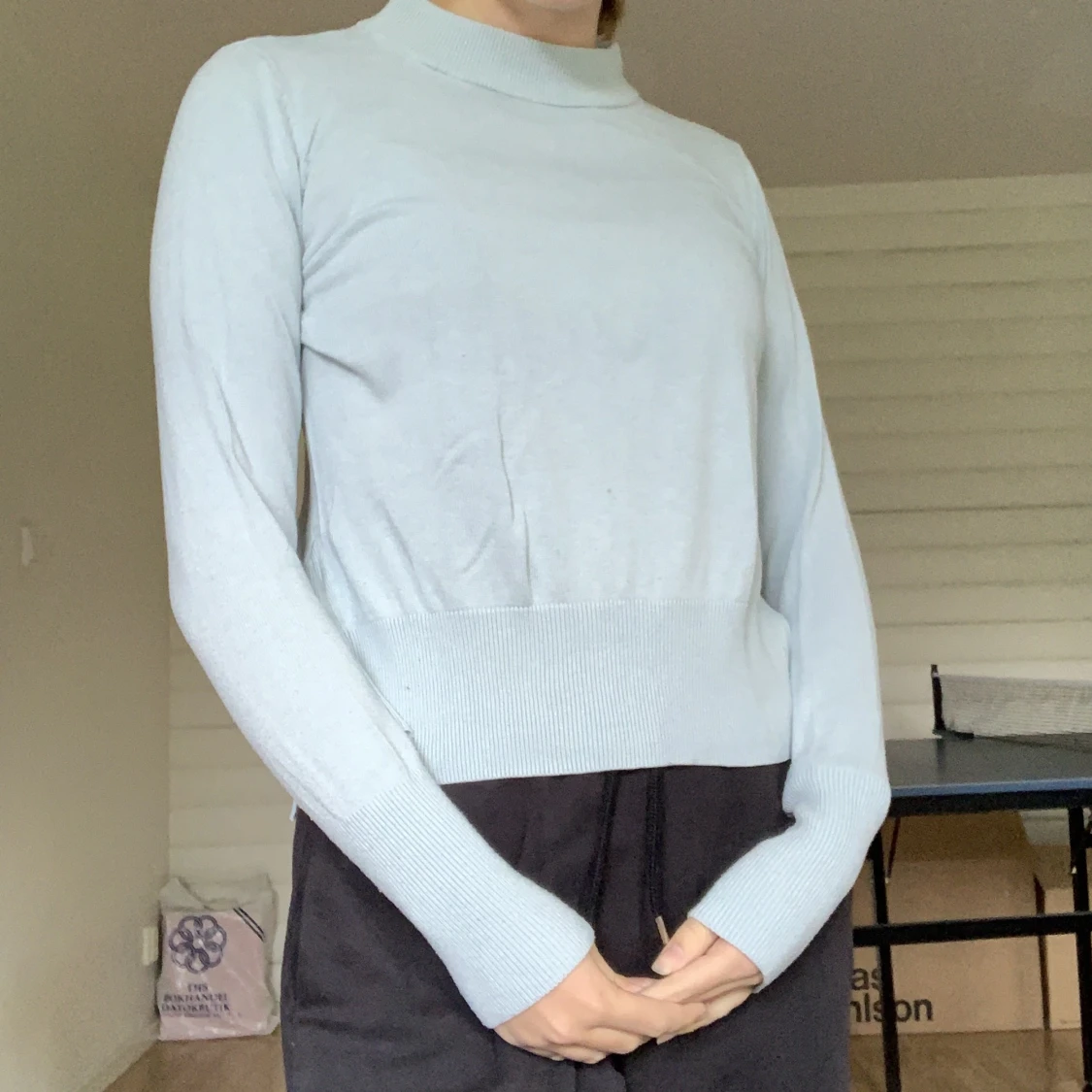 Ljusblå tröja