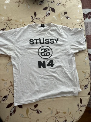 Stüssy No°4 Short Sleeve T-Shirt - Comfortable, roomy, stylish Stüssy shortsleeved tee. Great condition. 100% cotton. Made in Mexico.