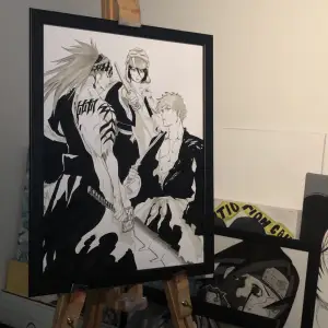 Drawing of the Bleach anime characters Renji, Rukia and Ichigo on thick paper with the size A3 paper put in black Ikea frame