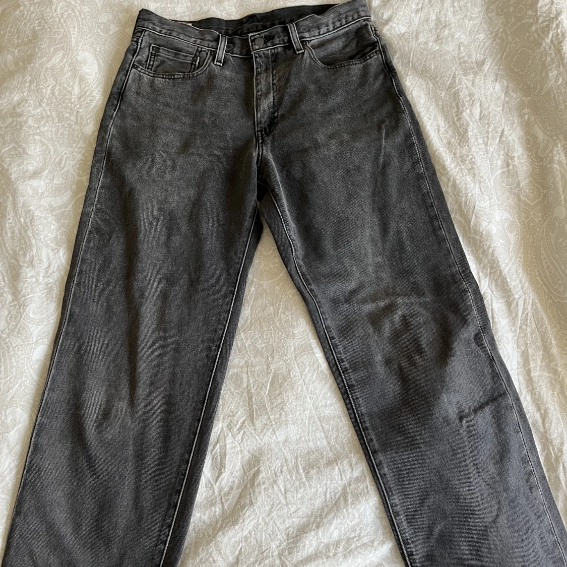 Gråa Levis Jeans 