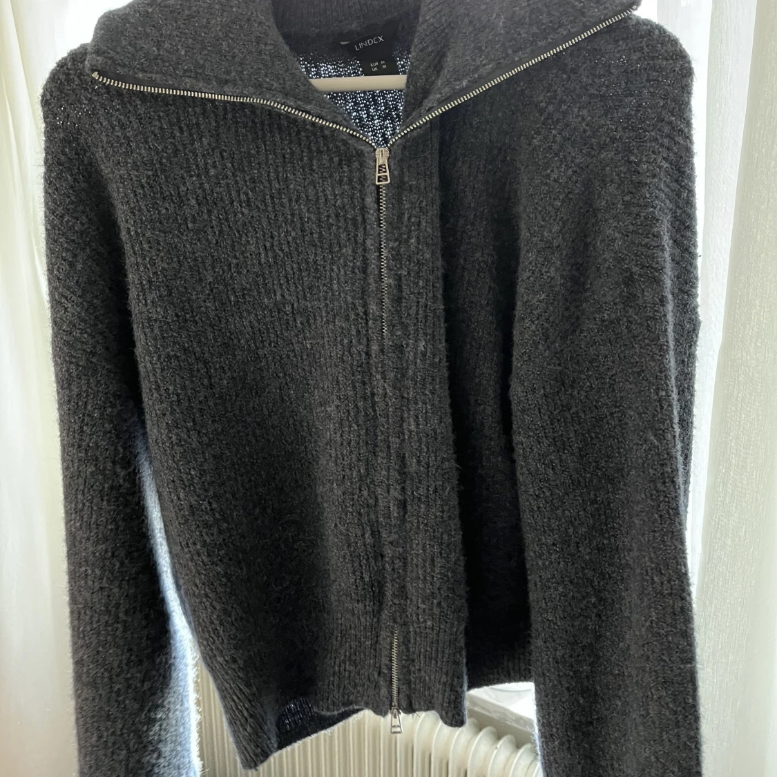 Marinblå stickad kofta - 90