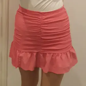 Rosa kjol använd endast 1 gång