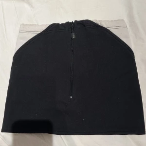 tub med dragkedja  - går att använda som både tubtopp och tubkjol 