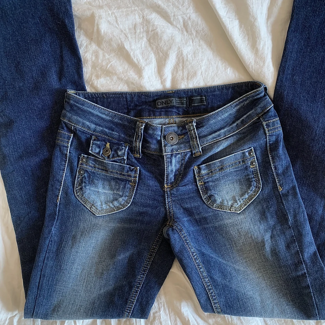 Lågmidjade utsvängda jeans - 90