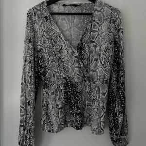 Långärmad tröja/blus - Långärmad mönstrad tröja/blus