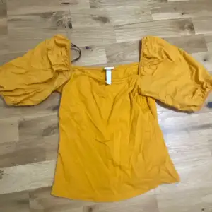 Senap gul tröja 