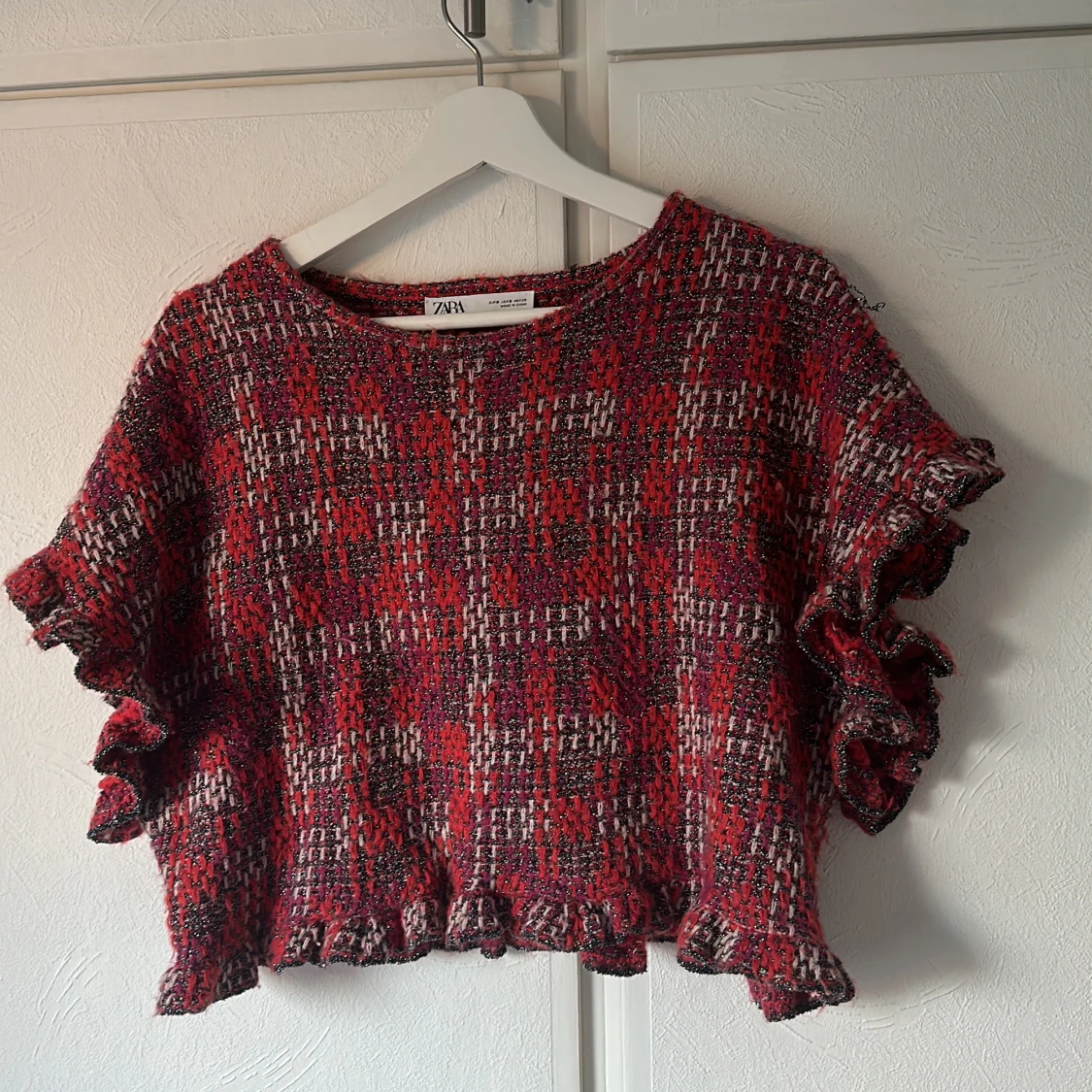 Färgglad stickad blus