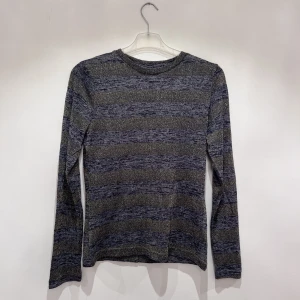 Topp  - Ny med prislapp 