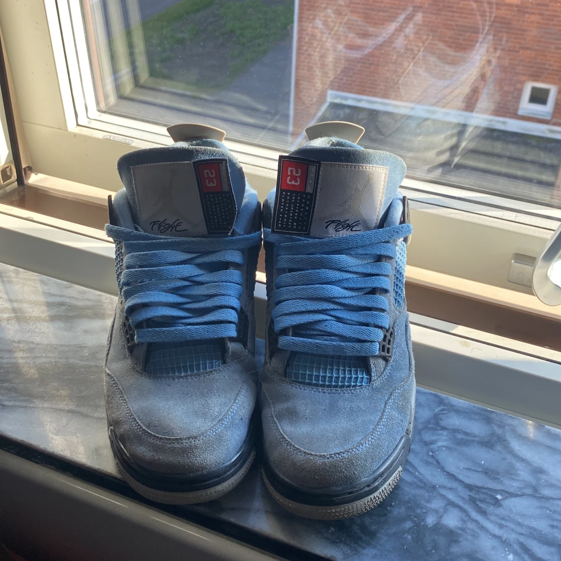 Jordan 4 UNC - 91
