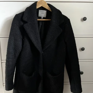 Ichi ullkappa - I använt men fint skick.