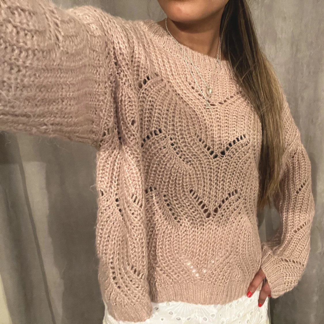 Rosa stickad tröja