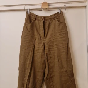 Bruna Tygbyxor - Bruna Tygbyxor  Brand: NA-KD  Size: 34