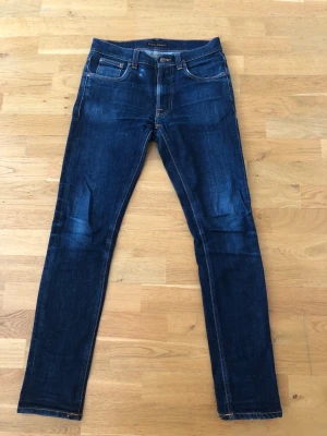 Nudie jeans blå Lean Dean. - Nudie jeans blå för herr. 30 / 34 Slimfit