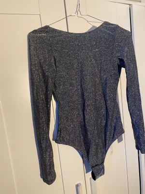 Open back bodysuit  - New never worn with tags bodysuit with open back from intimissimi 