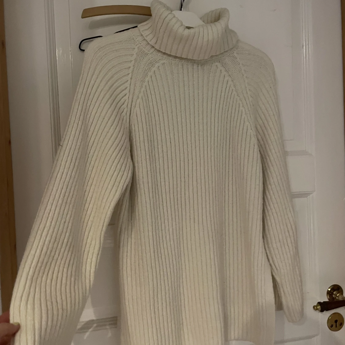 Lång kabelskornas turtleneck