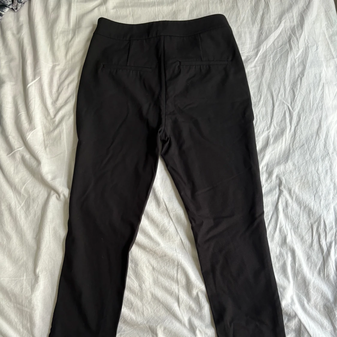 Svarta kostymbyxor - 90