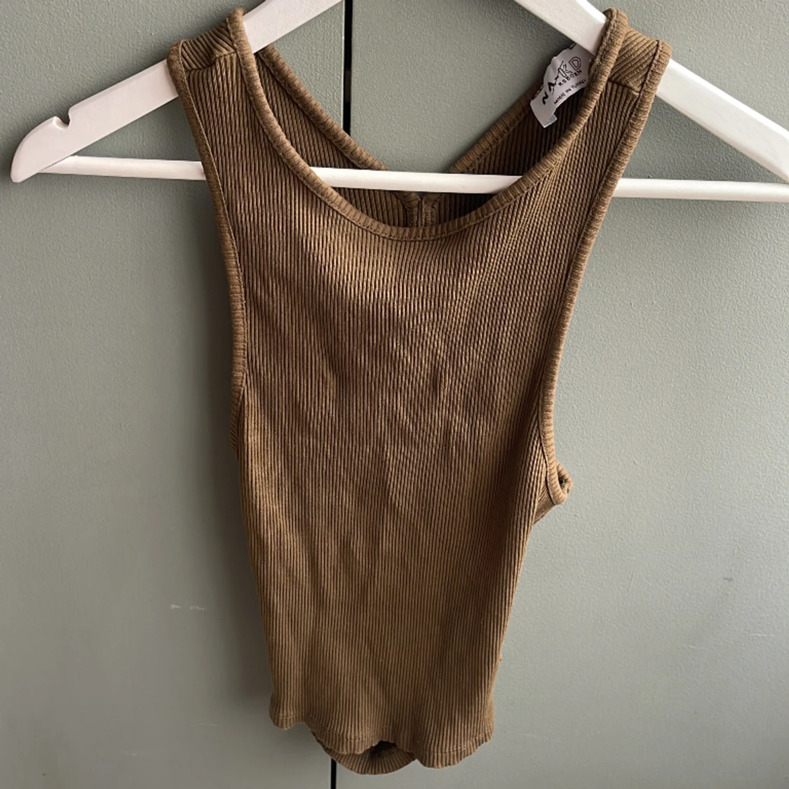 Linne med öppen rygg