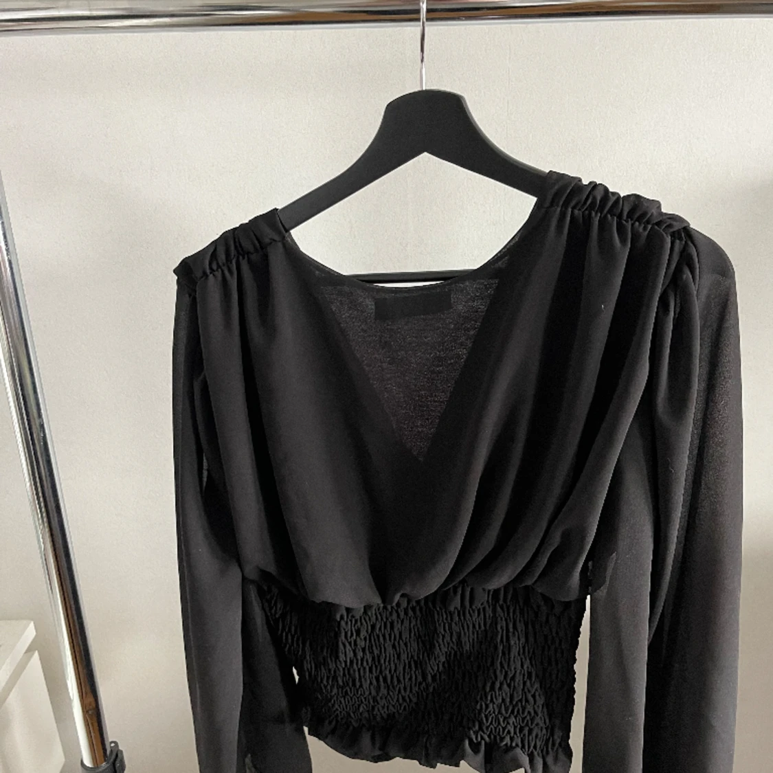 Topp med stora ärmar 