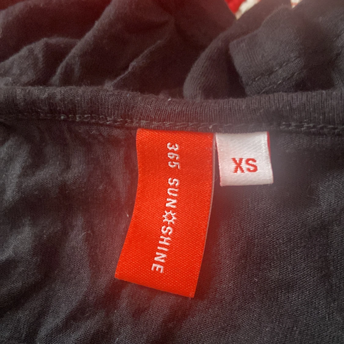 Svart ruffel top - 91