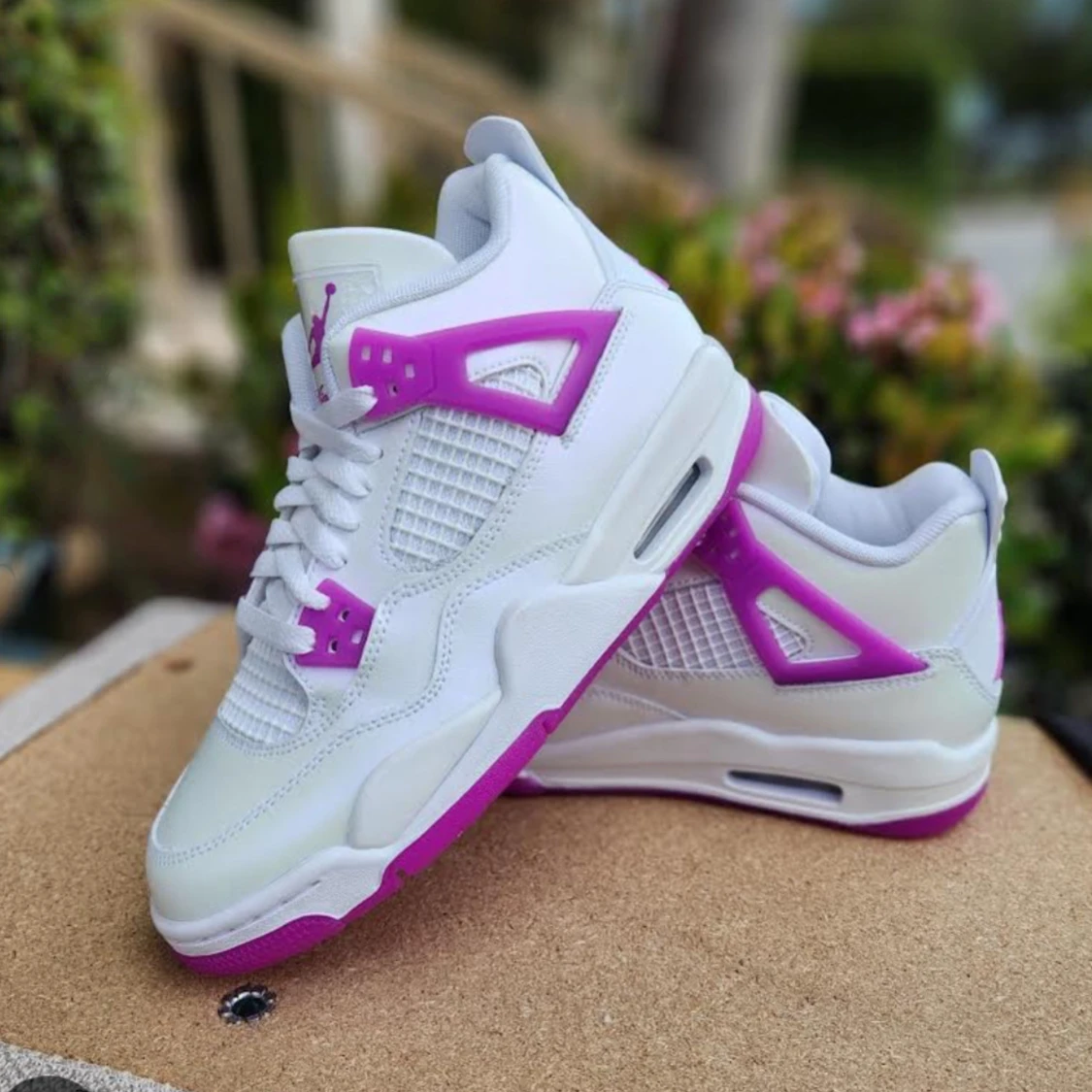 Jordan 4 pink lemonade