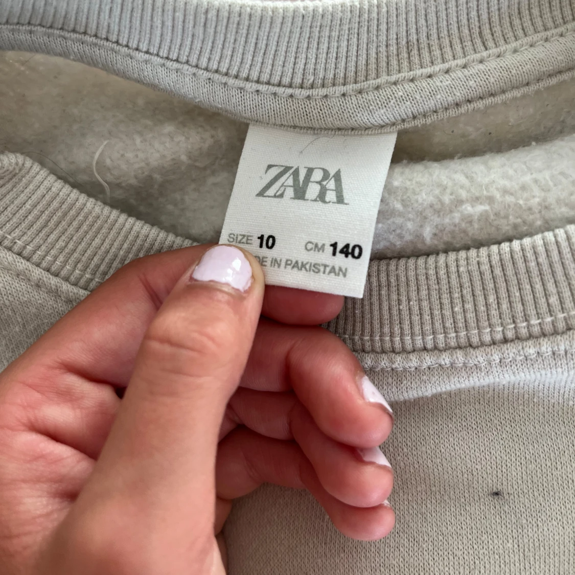 Tjocktröja med text - 90