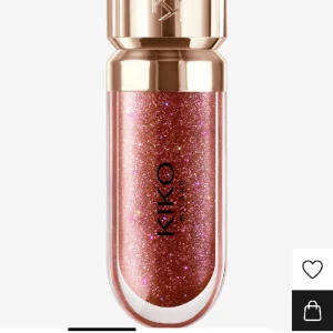 Läppglans  - Säljer kiko läppglans. Helt ny. Röd brun färg. Glitter/skimmer.  