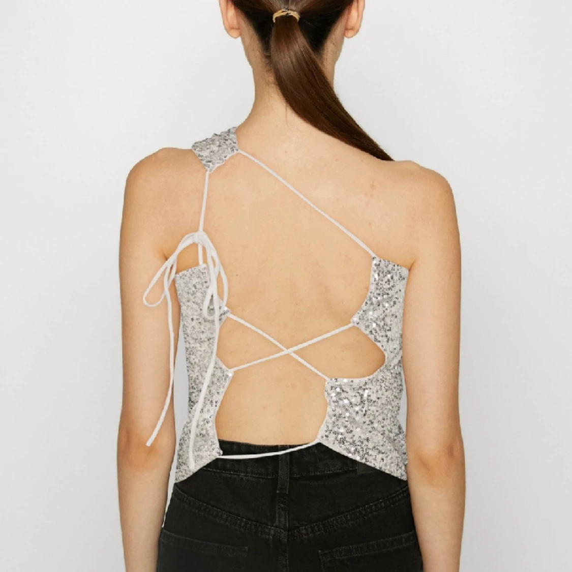 Glittrig topp från WEEKDAY - 91