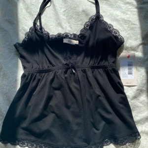 Nelly topp - Helt nytt linne från Nelly! Säljer då den är lite stor för mig. 