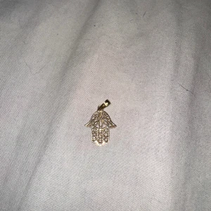 Fatimas hand guldsmycke  - Fatimas hand smycke i guld 