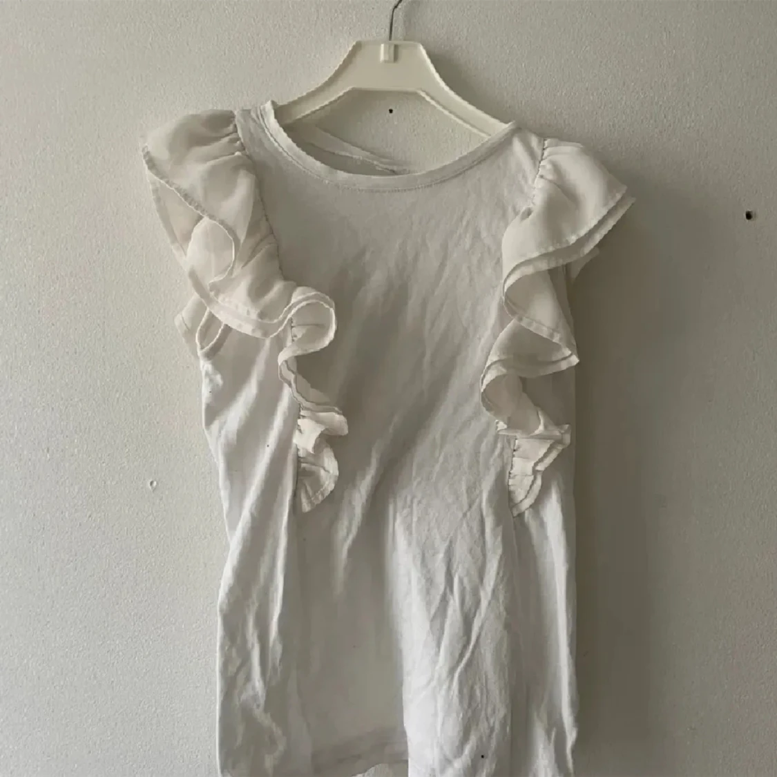 Blus/topp vit volang 