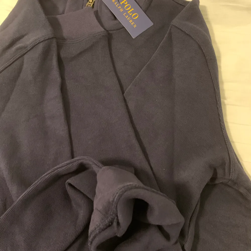 Color: Navy blue Size: L works if you are XL too (little bit big) Care label: Not recommended to machine wash if, (hand wash it). The material is really sensitive.  Comes with tags and the bag (Polo ralph lauren). Hoodies.