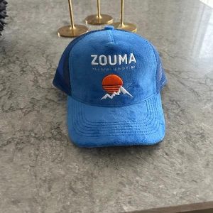 Zouma keps  - Jag säljer denna keps för jag inte har någon användning för den  Jag vann den på en tävling 