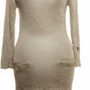 BUSNEL KLÄNNING STORLEK M NYSKICK  - Busnel klänning  Storlek m Bommul/viskos  Som ny