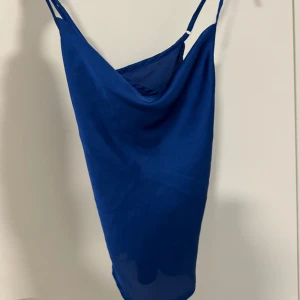 Topp - Oanvänd passar de som har xs och s.