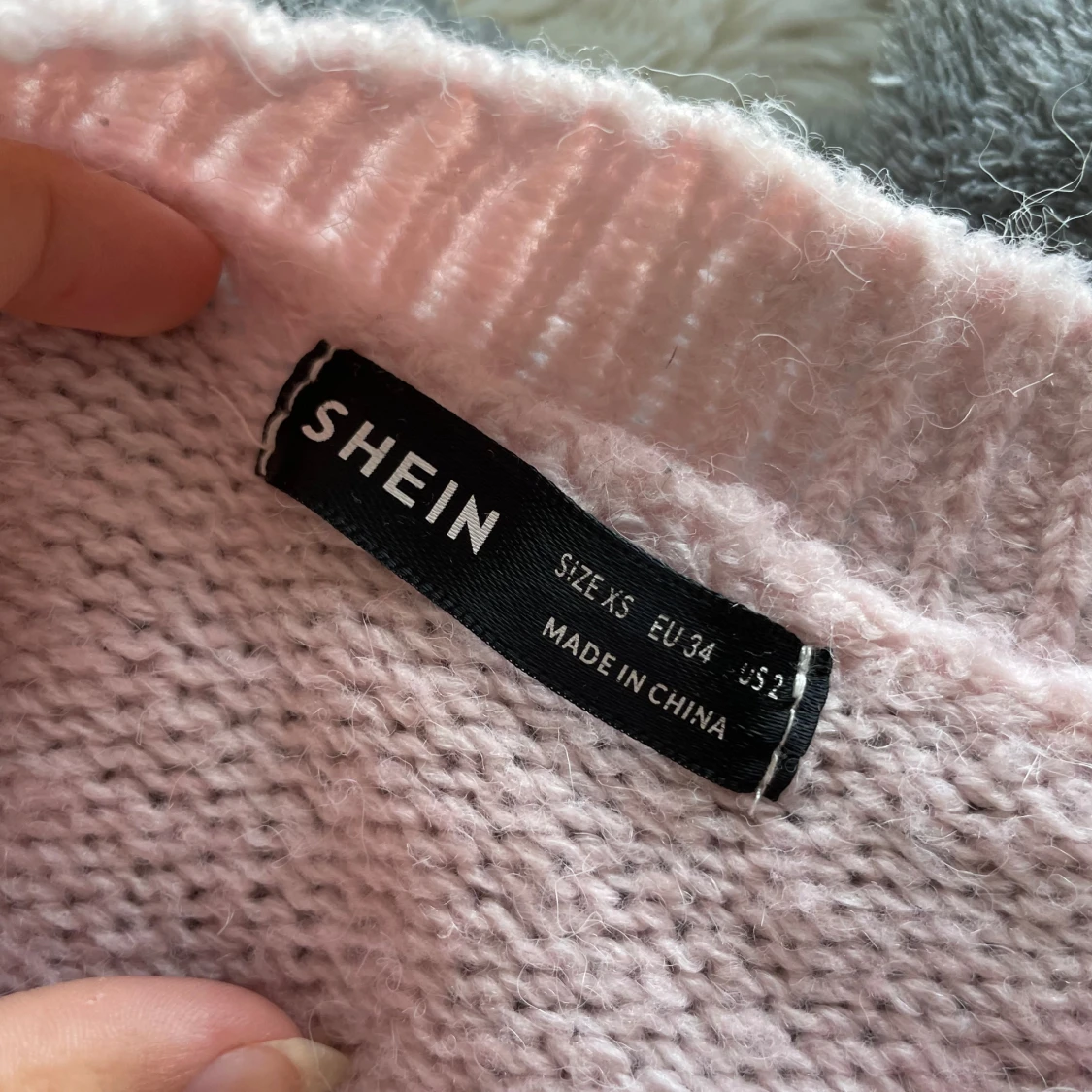 Ljusrosa stickad tröja  - 91