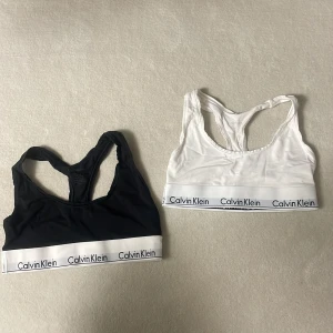 Calvin Klein - Säljer två stycken Calvin Klein toppar! Jätte bra skick och nästa helt oanvända! Säljer för 150kr styck!!!!